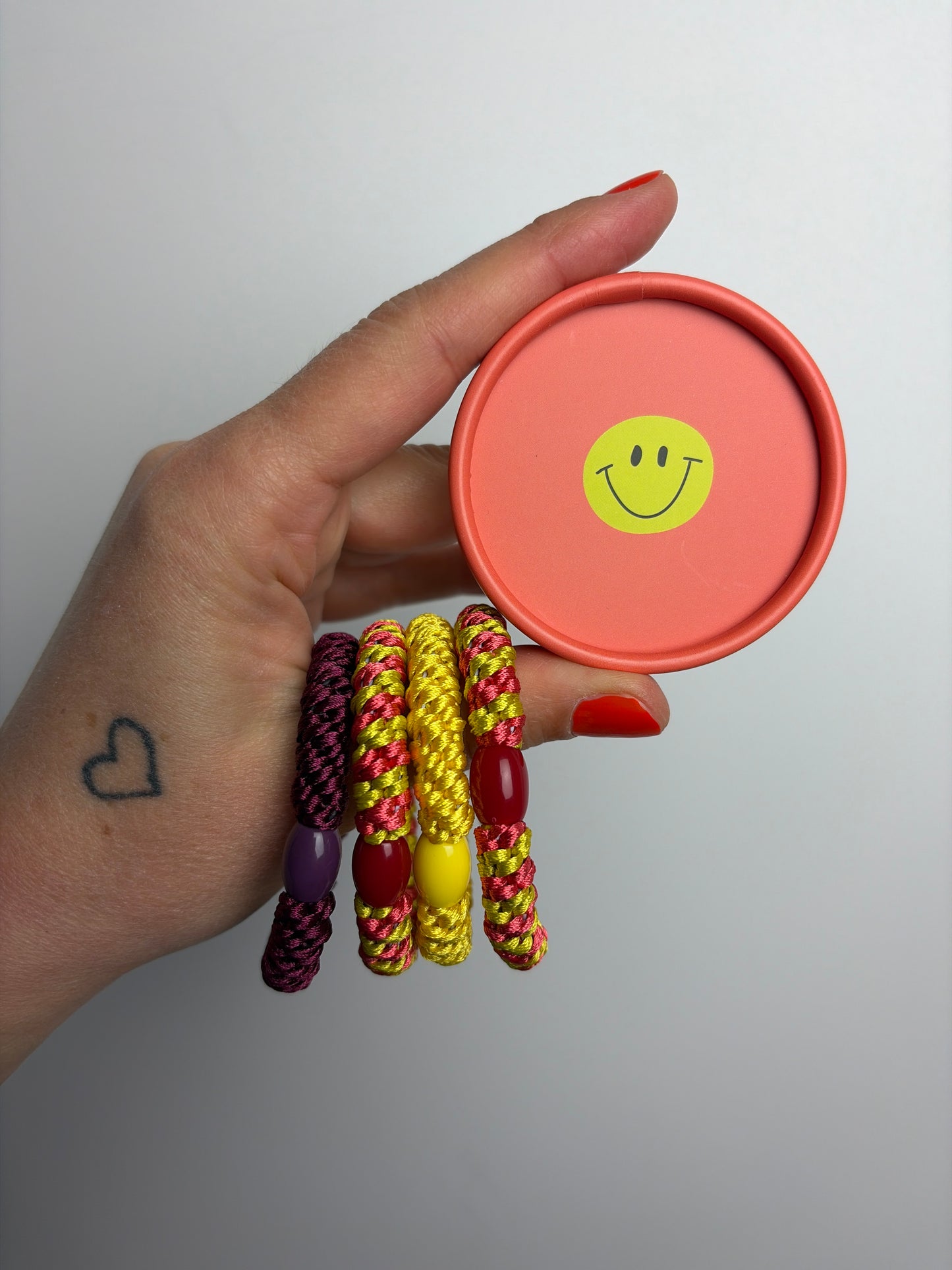 HAARGUMMI 4ER SET IN GESCHENKBOX • KORALLE GELB