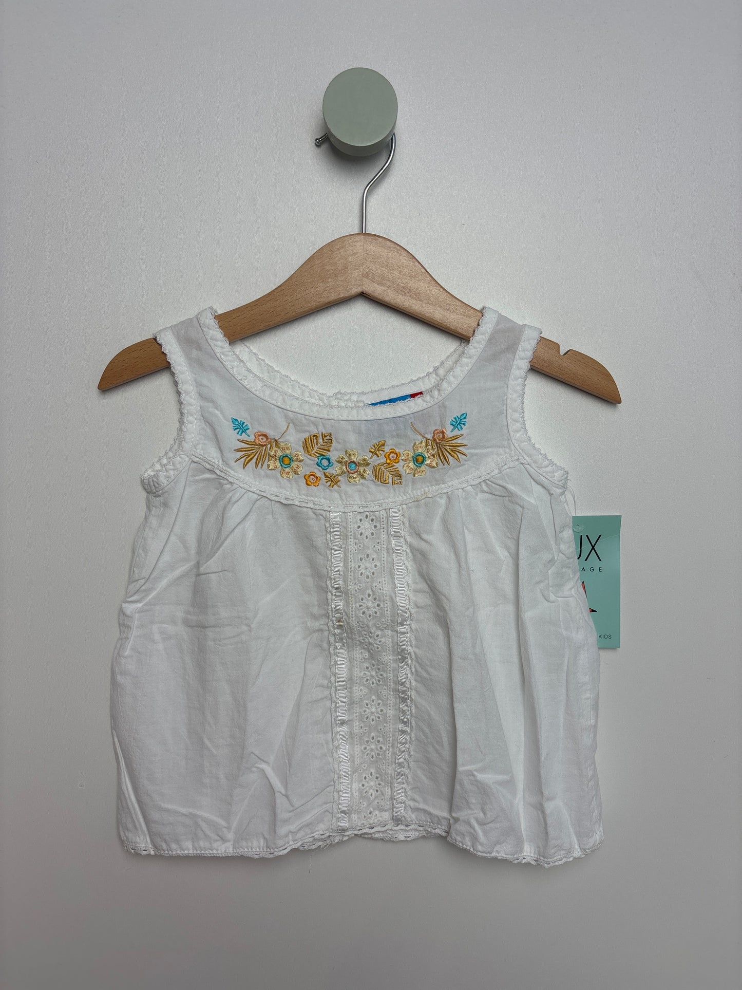 Bluse mit Blumenestickerei • 86 • topolino